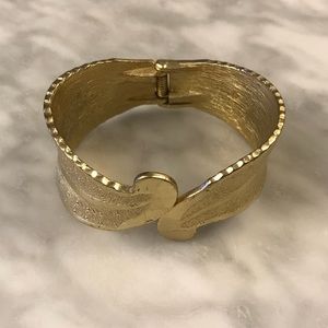 Gold colored bracelet